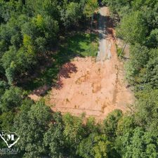 Aerial view of a cleared 2.5-acre homesite surrounded by trees in Campobello, South Carolina.