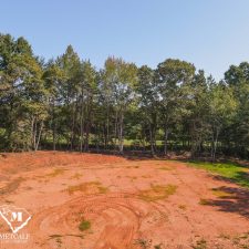 Cleared 2.5-acre homesite in Campobello, surrounded by trees and open land, ideal for building a private residence.