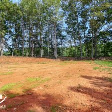 Cleared 2.5-acre homesite in Campobello, surrounded by trees and open land, ideal for building a private residence.